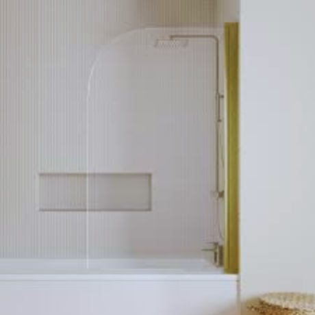 A modern bathroom featuring a tub and a brushed shower screen, showcasing a clean and elegant design.