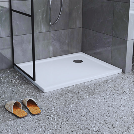 A white square acrylic shower tray in a modern bathroom setting, showcasing a clean and minimalist design.