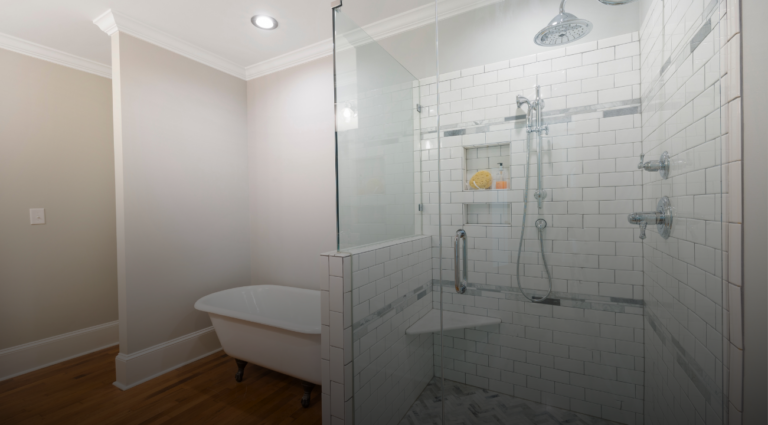 A modern bathroom featuring a shower and a tub, showcasing a stylish design and efficient use of space.